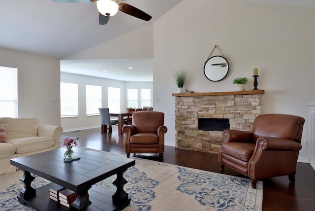 185 Tanner Rd, Branson, MO 65616 - living area featuring wood finished floors, vaulted ceiling, a fireplace, ceiling fan, and recessed lighting