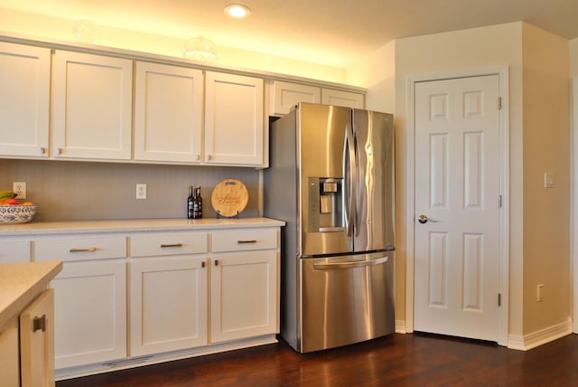 185 Tanner Rd, Branson, MO 65616 - kitchen with stainless steel refrigerator with ice dispenser, light countertops, white cabinets, dark wood-type flooring, and recessed lighting
