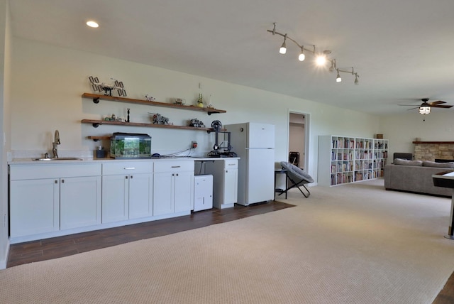 185 Tanner Rd, Branson, MO 65616 - kitchen featuring freestanding refrigerator, ceiling fan, white cabinets, open shelves, and light countertops