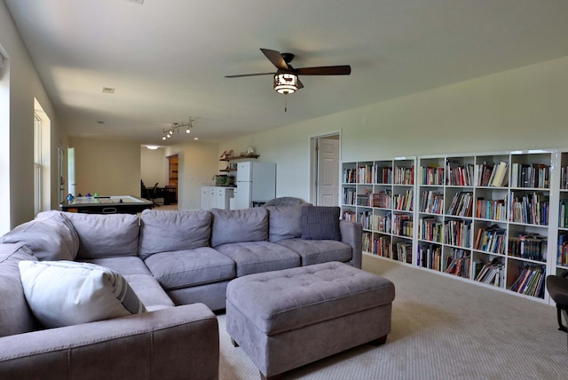185 Tanner Rd, Branson, MO 65616 - carpeted living room with ceiling fan