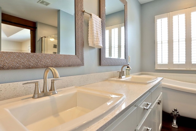 185 Tanner Rd, Branson, MO 65616 - bathroom with double vanity and a shower with shower door