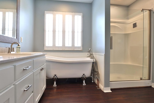 185 Tanner Rd, Branson, MO 65616 - full bath featuring vanity, a shower stall, wood finished floors, and a wainscoted wall