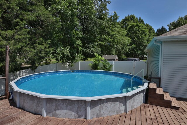 185 Tanner Rd, Branson, MO 65616 - view of swimming pool featuring a deck and a fenced backyard