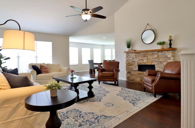 185 Tanner Rd, Branson, MO 65616 - living area with wood finished floors, a ceiling fan, a fireplace, and high vaulted ceiling