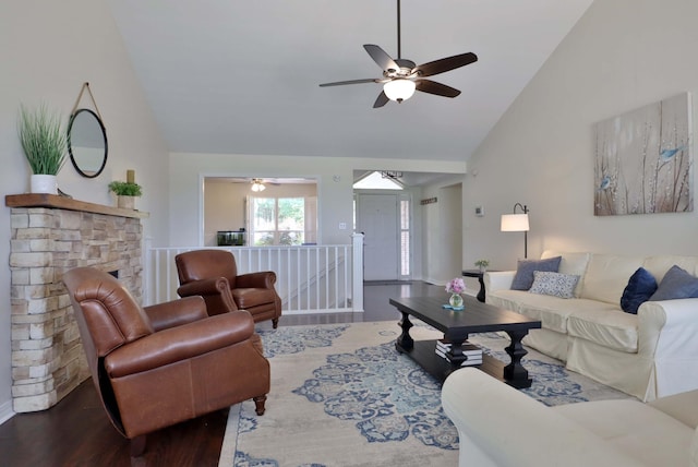 185 Tanner Rd, Branson, MO 65616 - living area with wood finished floors, a ceiling fan, and high vaulted ceiling
