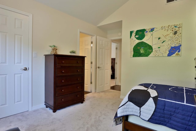 185 Tanner Rd, Branson, MO 65616 - carpeted bedroom with lofted ceiling and baseboards