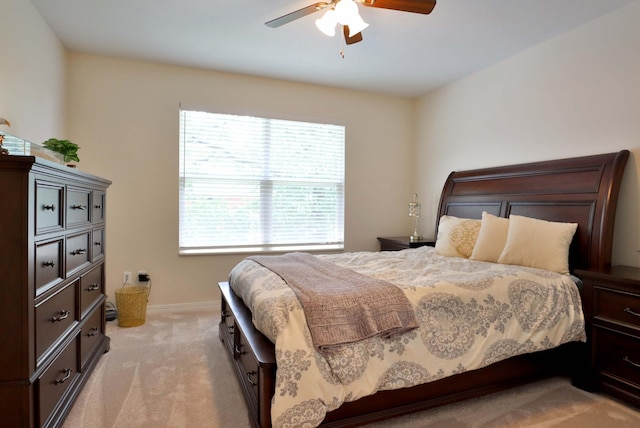 185 Tanner Rd, Branson, MO 65616 - bedroom with light carpet and a ceiling fan