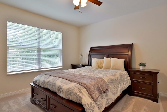 185 Tanner Rd, Branson, MO 65616 - bedroom with light colored carpet and a ceiling fan