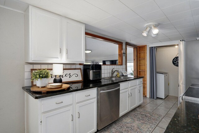 901 S 5th St, Ozark, MO 65721 - kitchen with stainless steel dishwasher, white cabinetry, backsplash, and dark stone counters