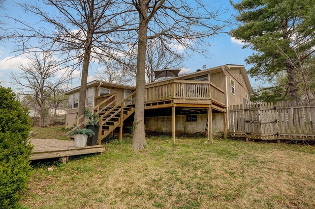 901 S 5th St, Ozark, MO 65721 - rear view of house featuring a wooden deck and stairway