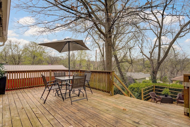 901 S 5th St, Ozark, MO 65721 - wooden terrace with outdoor dining area