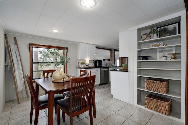 901 S 5th St, Ozark, MO 65721 - dining room with light tile patterned floors and built in features