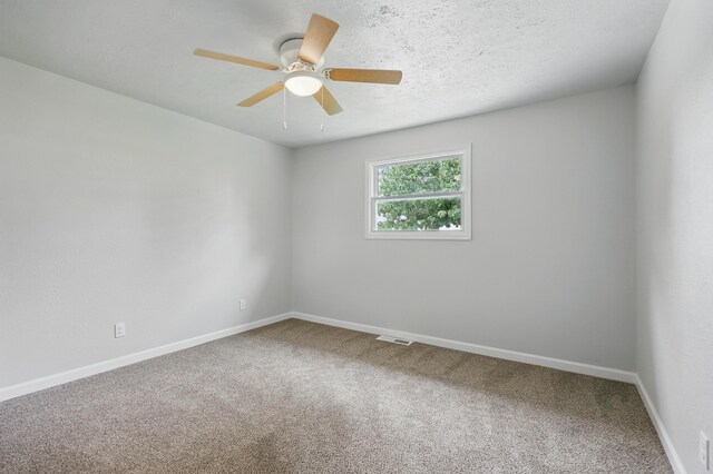 14289 Bethel Rd, Seneca, MO 64865 - spare room featuring carpet floors and a ceiling fan
