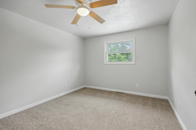 14289 Bethel Rd, Seneca, MO 64865 - empty room featuring carpet and ceiling fan