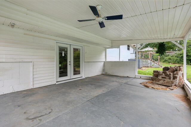 14289 Bethel Rd, Seneca, MO 64865 - view of patio featuring french doors, ceiling fan, and a carport