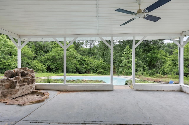 14289 Bethel Rd, Seneca, MO 64865 - unfurnished sunroom featuring ceiling fan