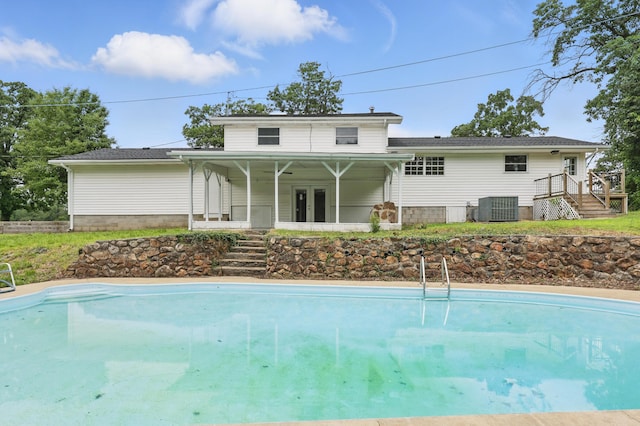 14289 Bethel Rd, Seneca, MO 64865 - rear view of house featuring an outdoor pool, stairs, and french doors