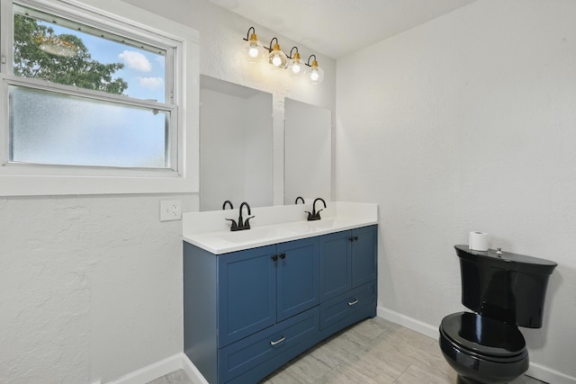14289 Bethel Rd, Seneca, MO 64865 - bathroom with double vanity and baseboards