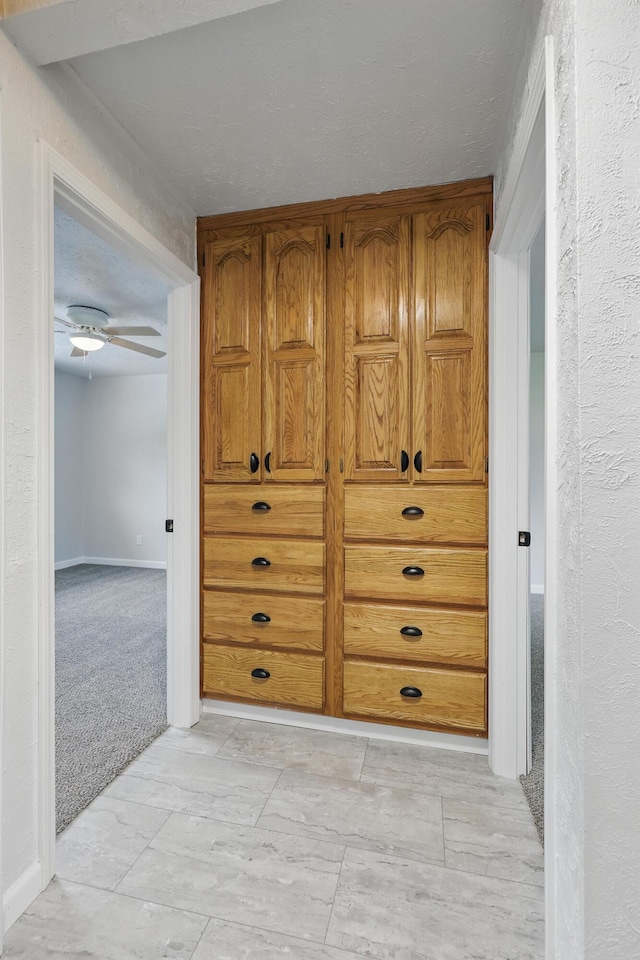 14289 Bethel Rd, Seneca, MO 64865 - detailed view of a ceiling fan and baseboards