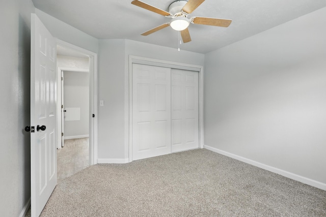 14289 Bethel Rd, Seneca, MO 64865 - unfurnished bedroom with carpet floors, a closet, and a ceiling fan
