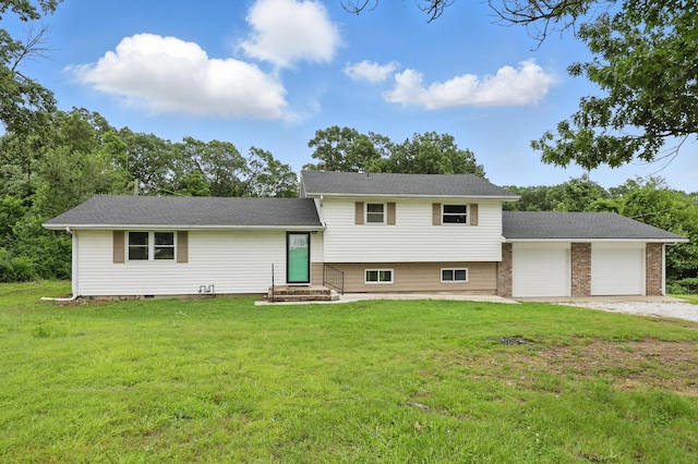 14289 Bethel Rd, Seneca, MO 64865 - split level home with entry steps, a front lawn, a garage, and driveway