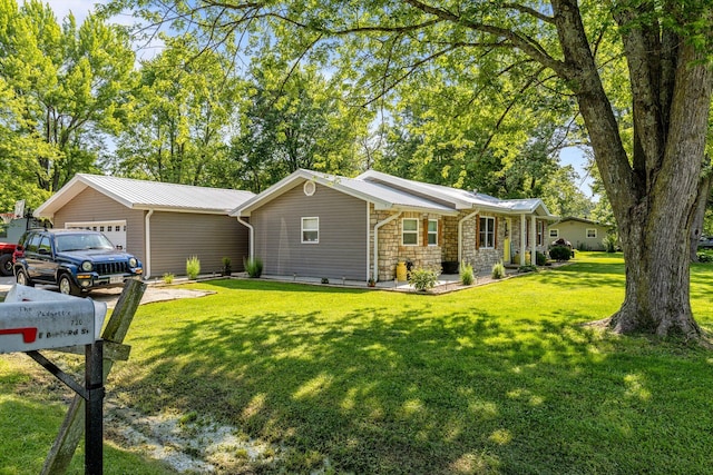 720 E Burford St, Marshfield, MO 65706 - ranch-style home with a front yard, stone siding, a metal roof, and an attached garage