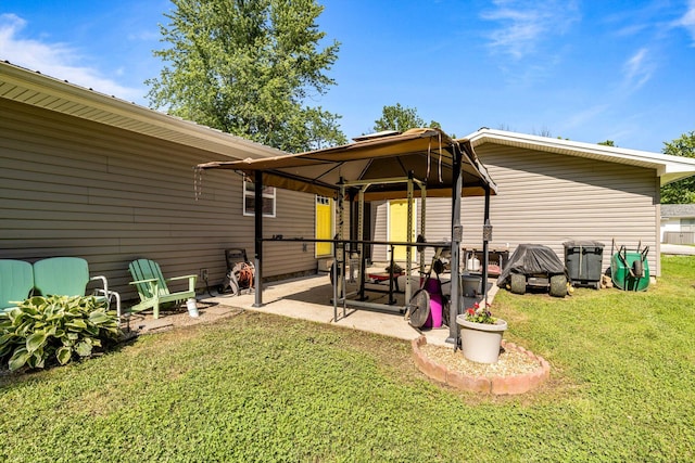 720 E Burford St, Marshfield, MO 65706 - back of house featuring a gazebo, a patio area, and a lawn