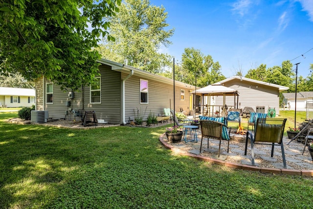 720 E Burford St, Marshfield, MO 65706 - back of house featuring a gazebo, a yard, and a patio area