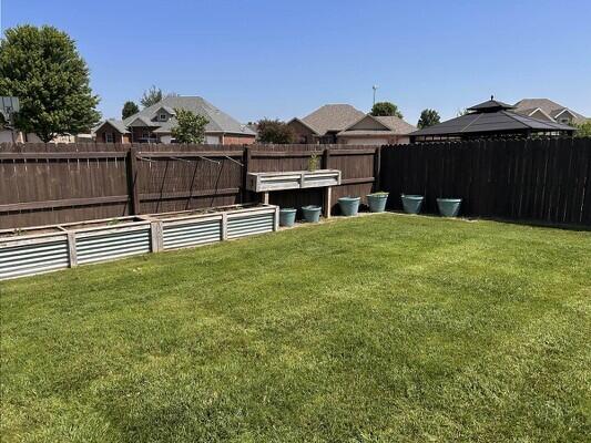 201 Sparrow Ln, Willard, MO 65781 - fenced backyard with a gazebo