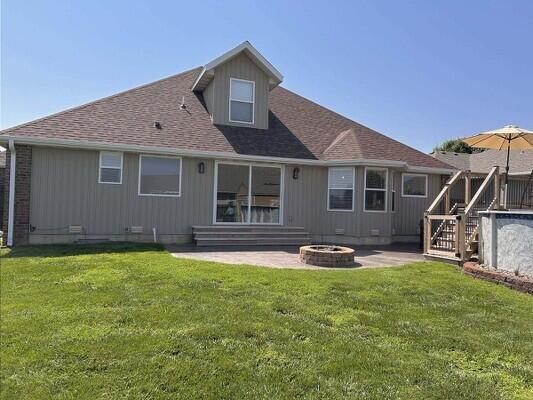 201 Sparrow Ln, Willard, MO 65781 - rear view of property with an outdoor fire pit, a patio, stairs, a yard, and a shingled roof