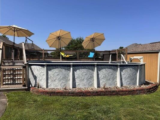 201 Sparrow Ln, Willard, MO 65781 - swimming pool with a lawn