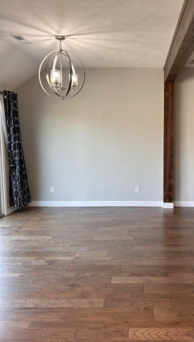 201 Sparrow Ln, Willard, MO 65781 - unfurnished room with a chandelier, wood finished floors, and a textured ceiling