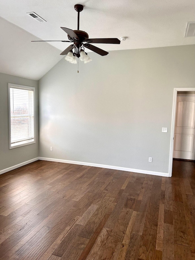201 Sparrow Ln, Willard, MO 65781 - unfurnished room featuring lofted ceiling, dark wood-style flooring, ceiling fan, and a smoke detector