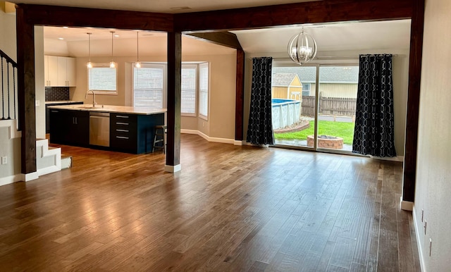 201 Sparrow Ln, Willard, MO 65781 - kitchen featuring light countertops, a chandelier, dishwasher, and healthy amount of natural light