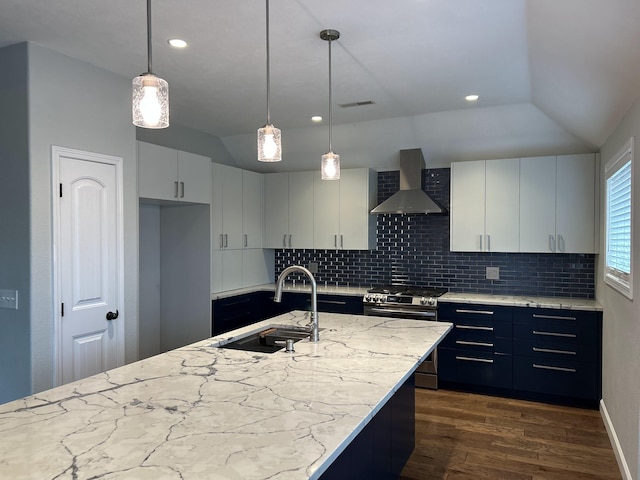 201 Sparrow Ln, Willard, MO 65781 - kitchen with wall chimney range hood, gas range, dark wood-style floors, tasteful backsplash, and vaulted ceiling