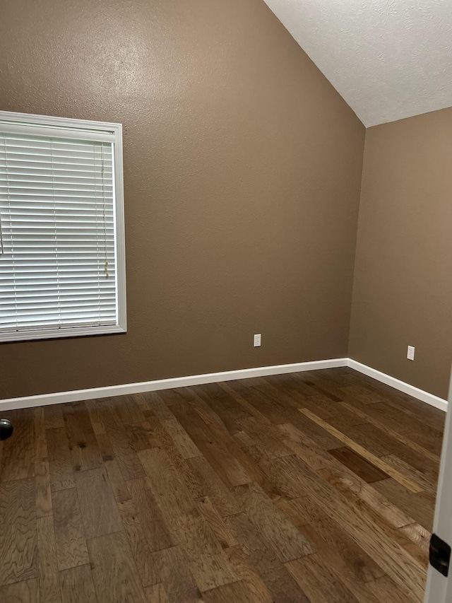 201 Sparrow Ln, Willard, MO 65781 - empty room with dark wood-style flooring and lofted ceiling
