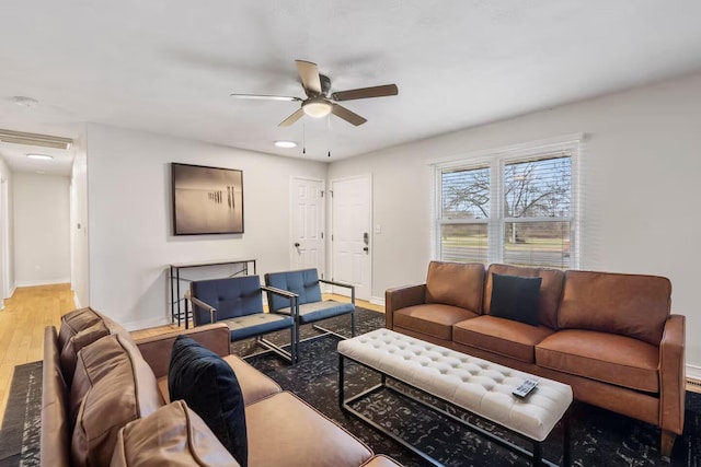 2436 S National Ave, Springfield, MO 65804 - living area with ceiling fan and wood finished floors