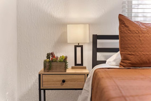 2436 S National Ave, Springfield, MO 65804 - bedroom featuring a textured wall