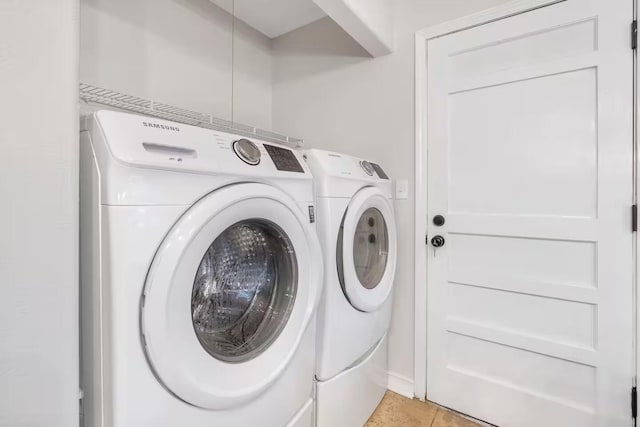 2436 S National Ave, Springfield, MO 65804 - laundry room with separate washer and dryer and light tile patterned floors