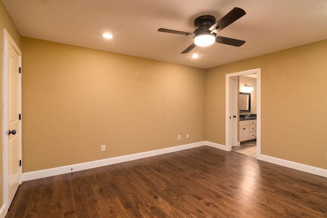 147 River Bluff Dr, Branson, MO 65616 - spare room with a ceiling fan, dark wood-style floors, and recessed lighting