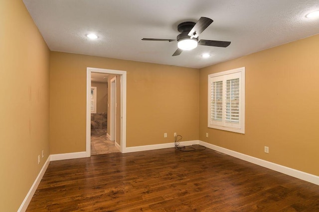 147 River Bluff Dr, Branson, MO 65616 - unfurnished room featuring dark wood-type flooring, ceiling fan, and recessed lighting