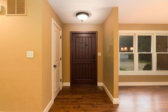 147 River Bluff Dr, Branson, MO 65616 - entrance foyer with dark wood-style flooring and baseboards