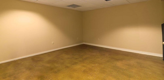 147 River Bluff Dr, Branson, MO 65616 - empty room with a drop ceiling and dark colored carpet