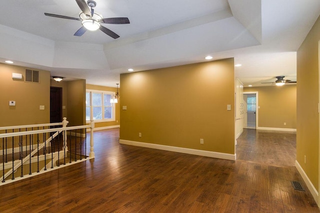 147 River Bluff Dr, Branson, MO 65616 - unfurnished room with ceiling fan, dark wood-style flooring, recessed lighting, and a chandelier