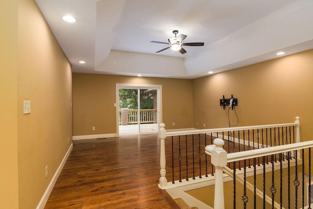 147 River Bluff Dr, Branson, MO 65616 - unfurnished room featuring a ceiling fan, wood finished floors, recessed lighting, and a raised ceiling