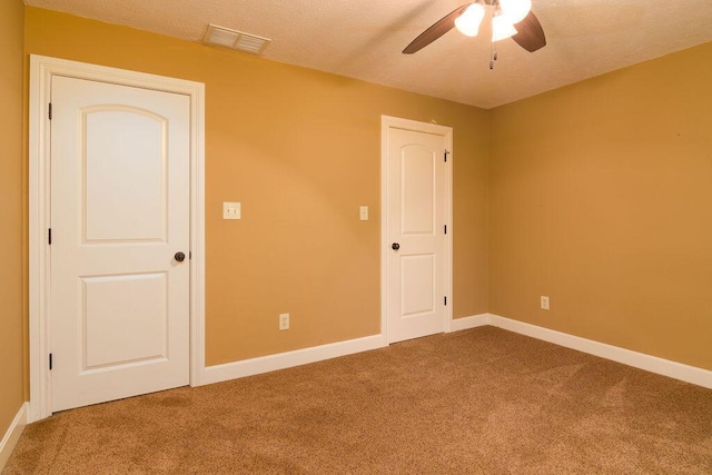 147 River Bluff Dr, Branson, MO 65616 - carpeted spare room featuring ceiling fan and a textured ceiling