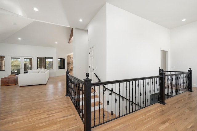 621 S Woodhaven Rd, Nixa, MO 65714 - corridor featuring an upstairs landing, high vaulted ceiling, wood finished floors, and recessed lighting