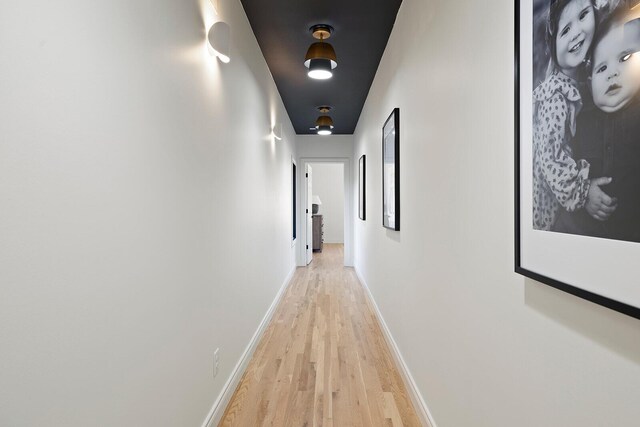 621 S Woodhaven Rd, Nixa, MO 65714 - hallway featuring light wood-style floors and baseboards