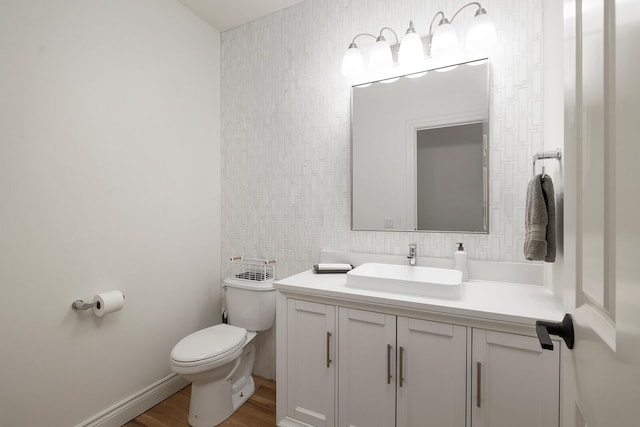 621 S Woodhaven Rd, Nixa, MO 65714 - half bathroom featuring vanity and wood finished floors
