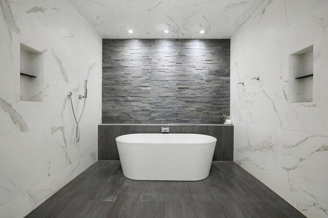 621 S Woodhaven Rd, Nixa, MO 65714 - full bathroom featuring a freestanding bath and tile walls